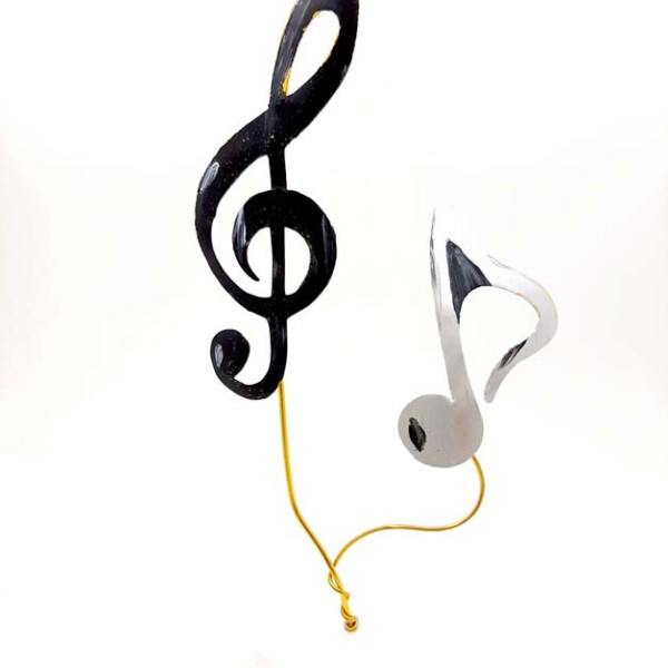 Handmade gift for music lovers treble clef and brass note on hand painted pebble