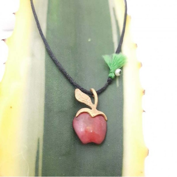 Handmade pendant made of 14 carat gold and brass